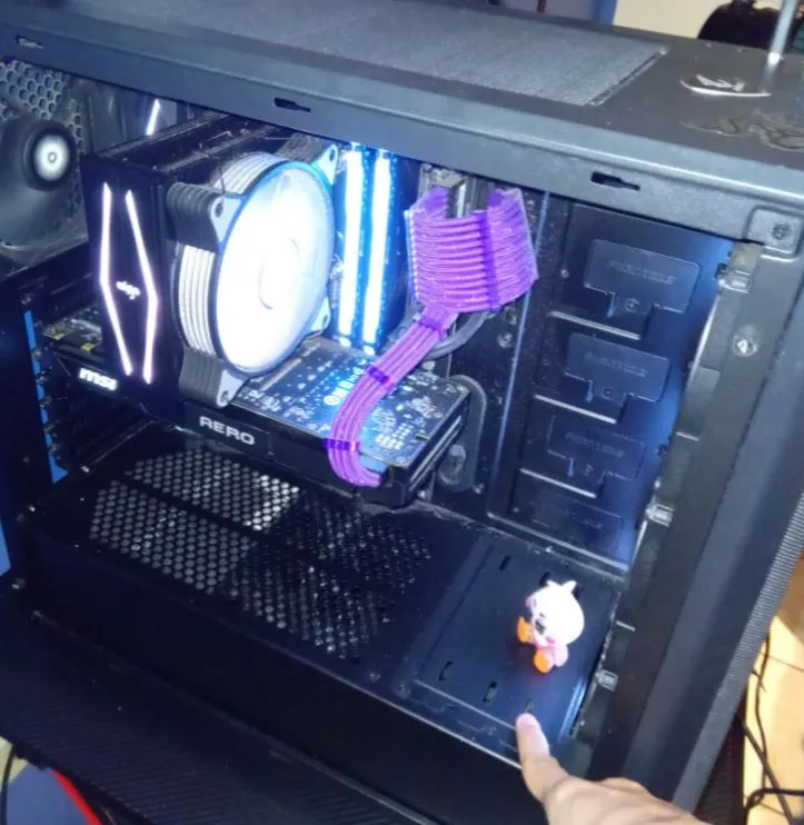 opening the lid of a gaming PC